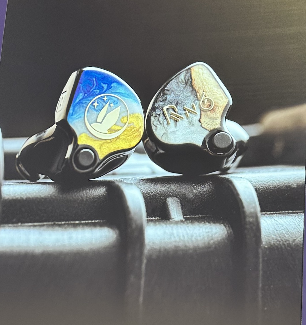 High-end bejewelled in-ear monitors on display at the Hong Kong AV Show 2023, shown with Astell and Kern DAP