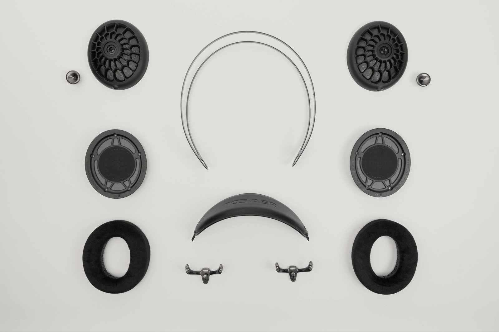 Meze Audio 105 AER serviceable parts Meze Audio 105 AER taken apart, with ear cups, drivers, headband, ear pads and hardware laid out