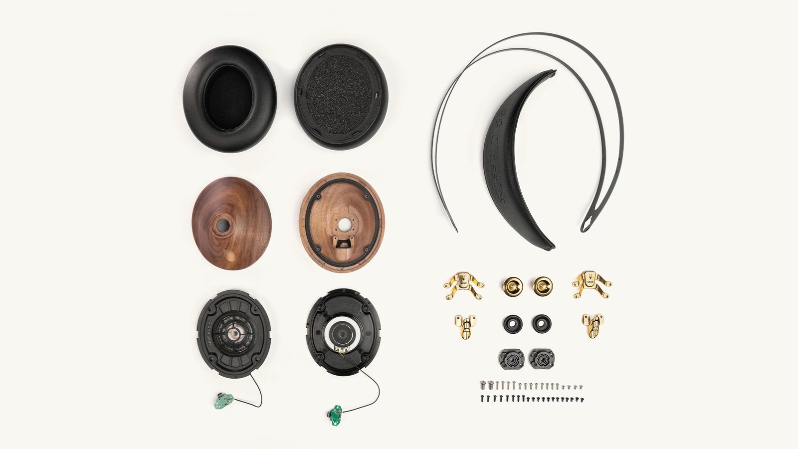 99 Classics 2nd Gen serviceable parts The 99 Classics 2nd Gen taken apart, with ear pads, walnut cups, drivers, headband and hardware laid out