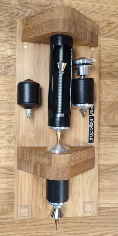 Inside an Atacama hi-fi rack leg support showing internal stud and tuning counterweight