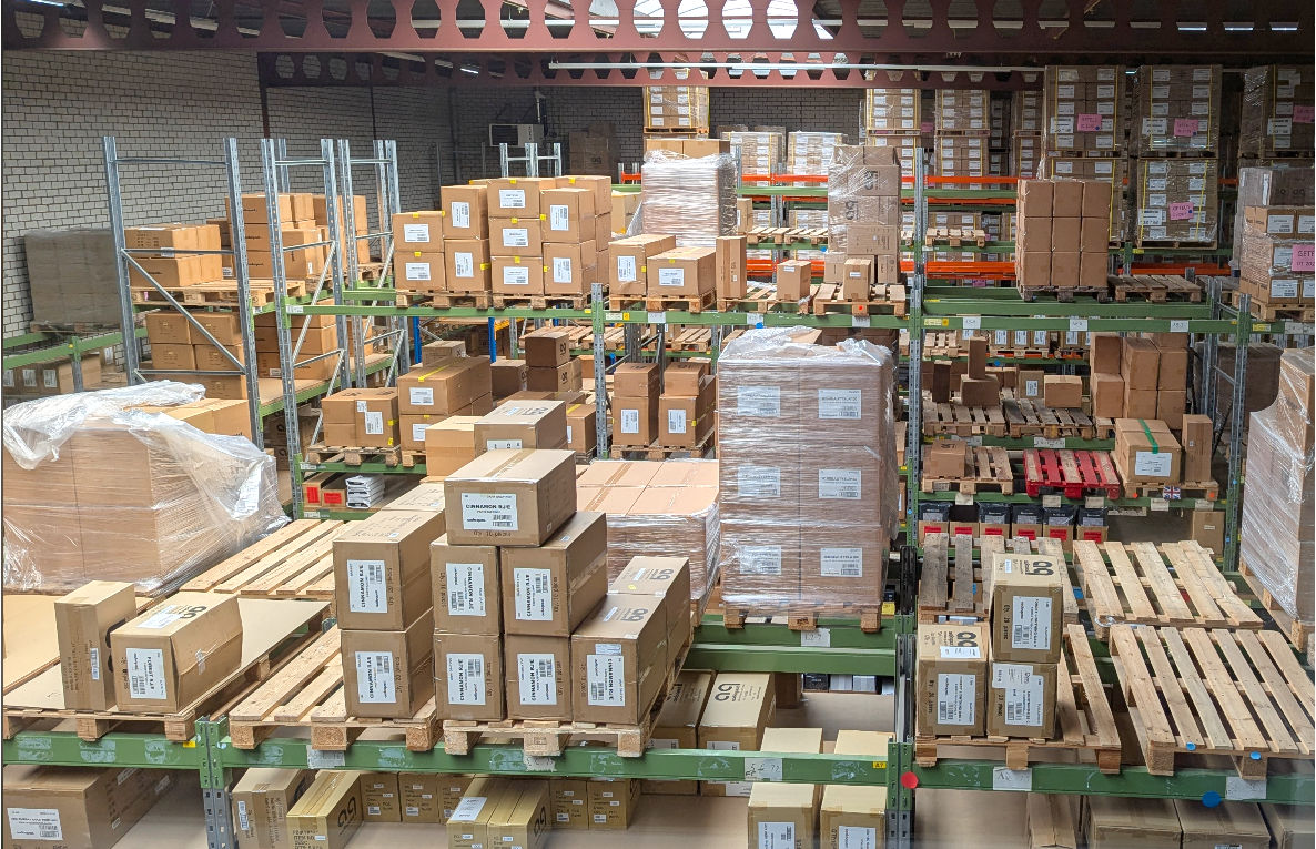 AudioQuest warehouse stacked with product including Niagara power conditioners