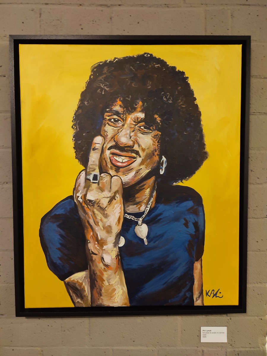 Loud and Clear hi-fi shop interior showing Kyle Blain musician paintings and vintage valve tester