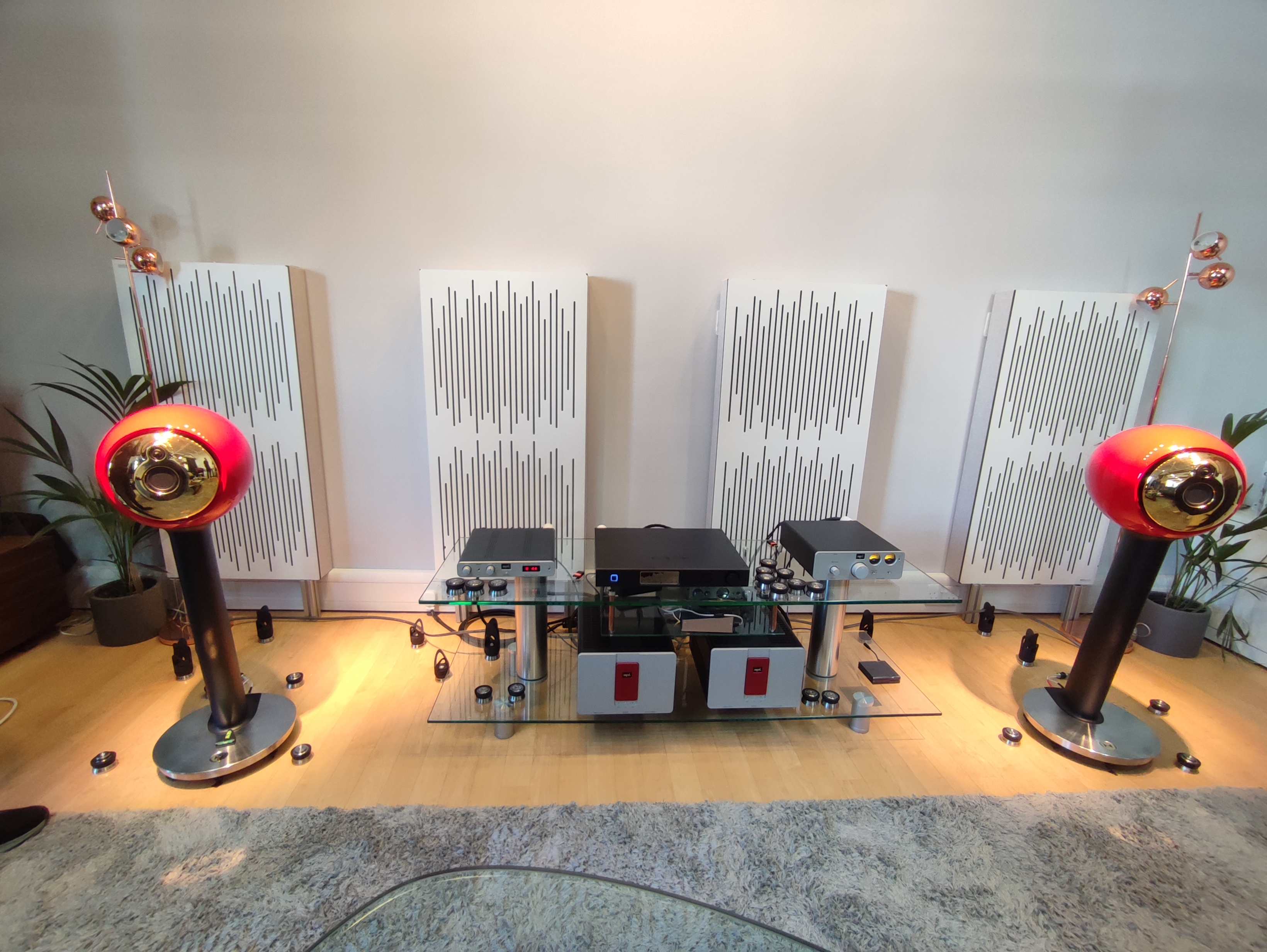 Node Audio SS1 cable risers elevating speaker cables in a full hi-fi system demonstration