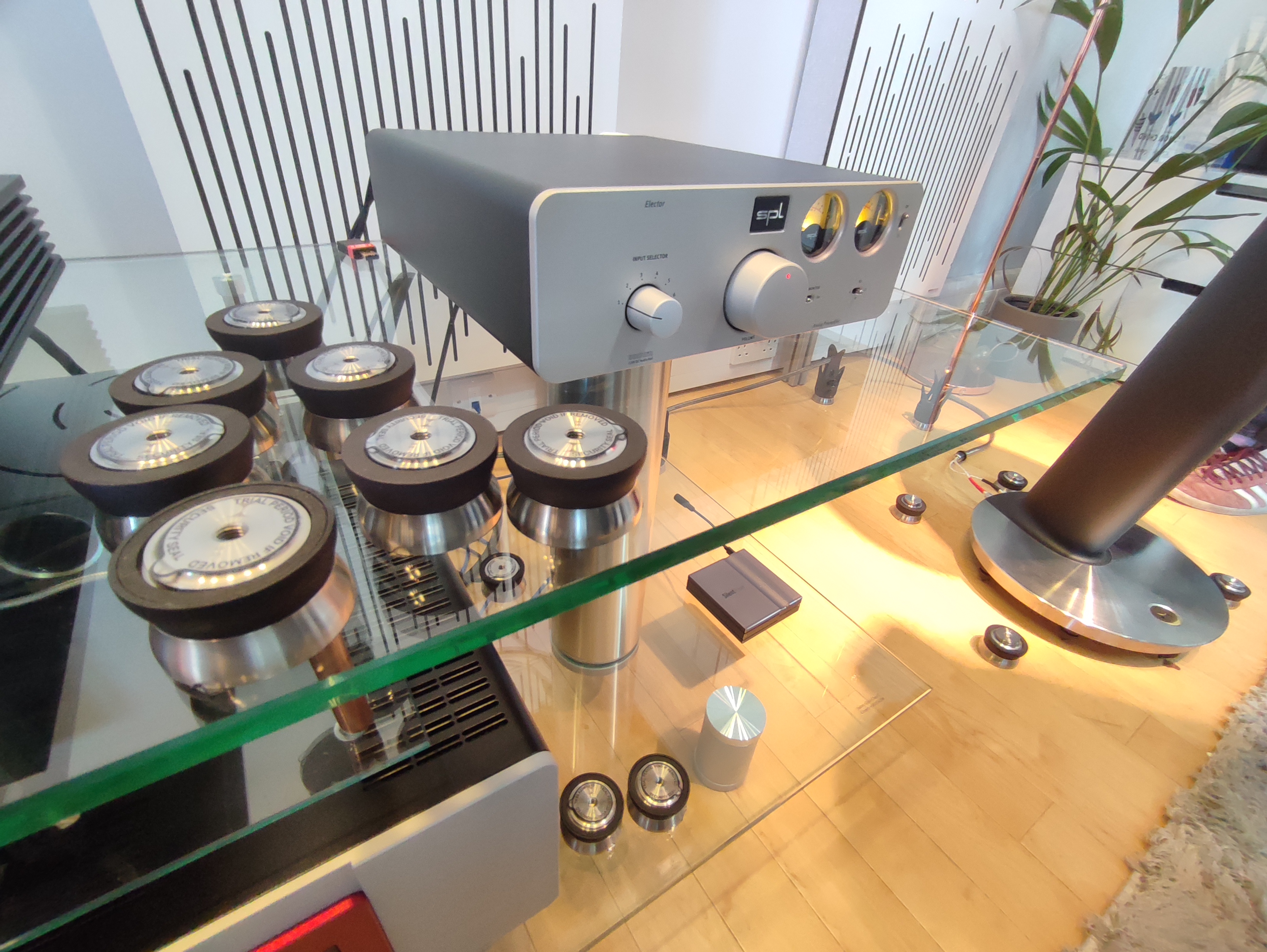 Node Audio SS1 isolation pucks installed beneath hi-fi components in a full system demonstration setup