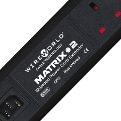 Wireworld Matrix V2 6-way passive power distribution hub showing IEC input and six UK power sockets